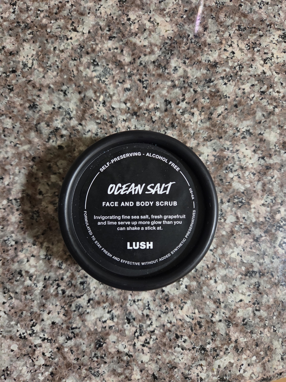 LUSH Ocean Salt Face and Body Scrub - 2.4 Oz Black Jar